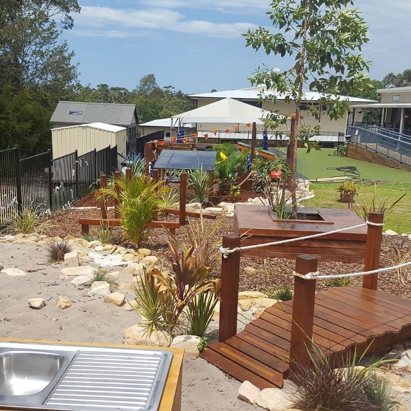 A Wooden Deck With a Sink in the Foreground — Garden Vogue in Charlestown, NSW
