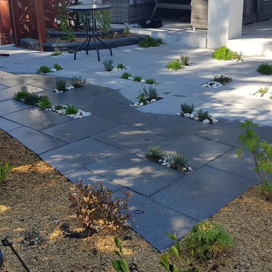 A Patio With a Table and Chairs — Garden Vogue in Charlestown, NSW