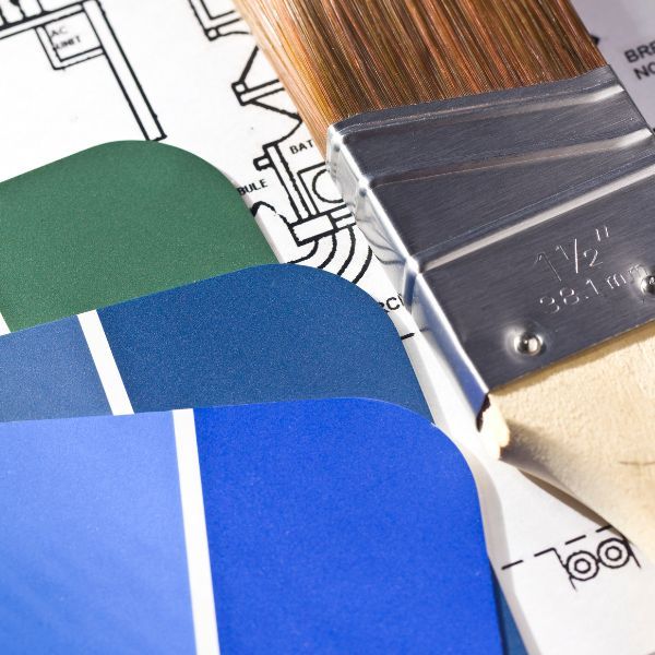 Paint swatches and a fresh paint brush.