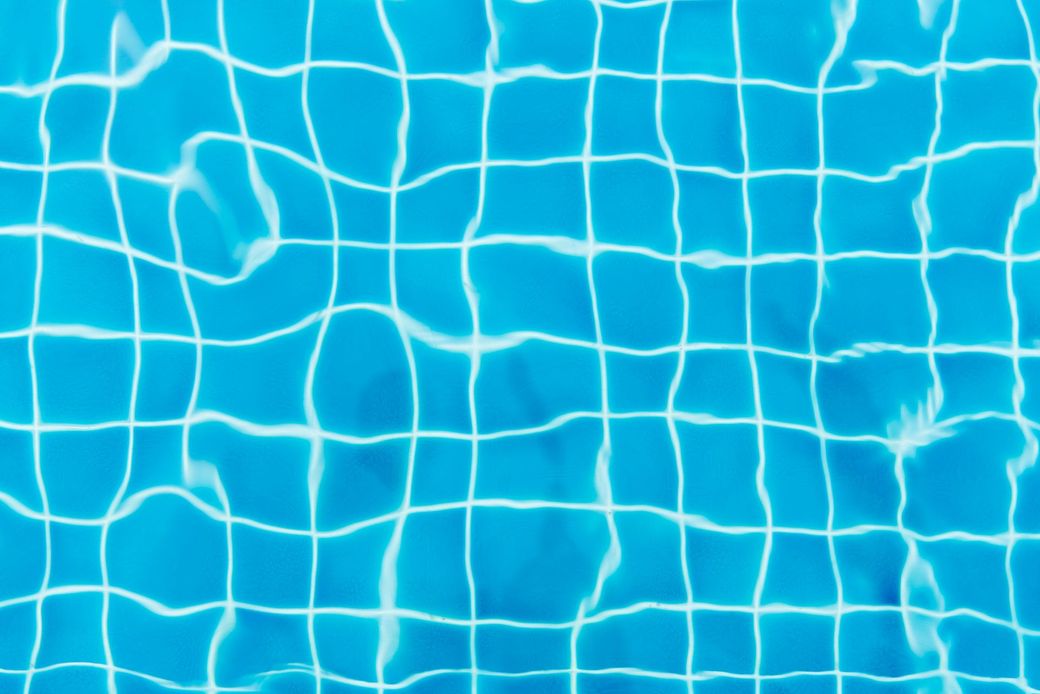 Bottom of a pool viewed from above the water.