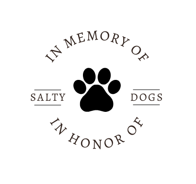 A black and white logo with a paw print and the words `` in memory of dogs ''.