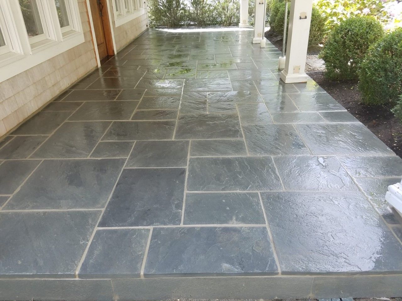 A patio with a lot of tiles on it