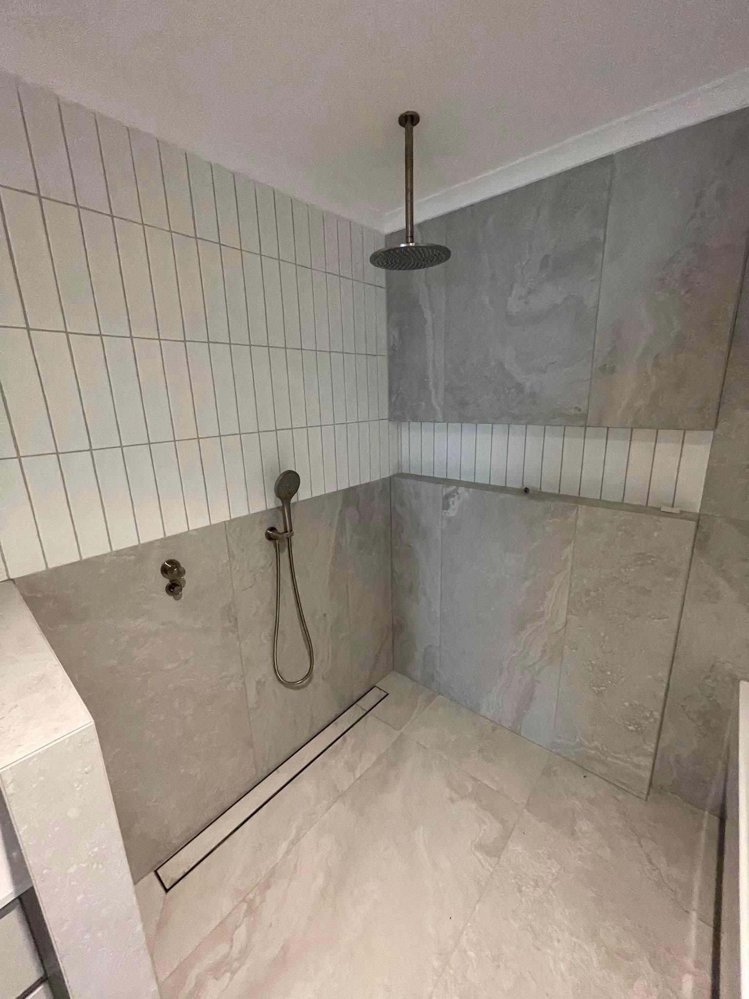 Grey Tiled Shower with Overhead Rain Shower Head and Handheld Shower — 2 Foote Plumbing & Gas in Darwin, NT