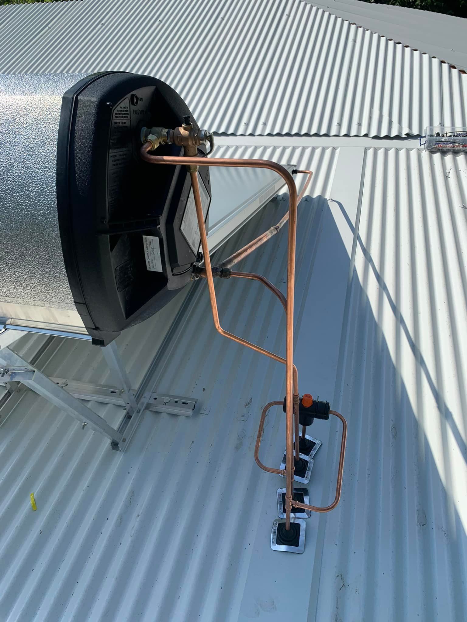 Solar Hot Water Heater on A Corrugated Metal Roof — 2 Foote Plumbing & Gas in Darwin, NT