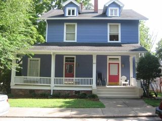 611 Washington blue single family home with a porch