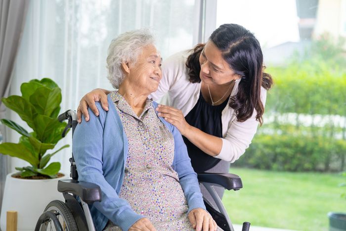 caregiver daughter help asian senior elderly