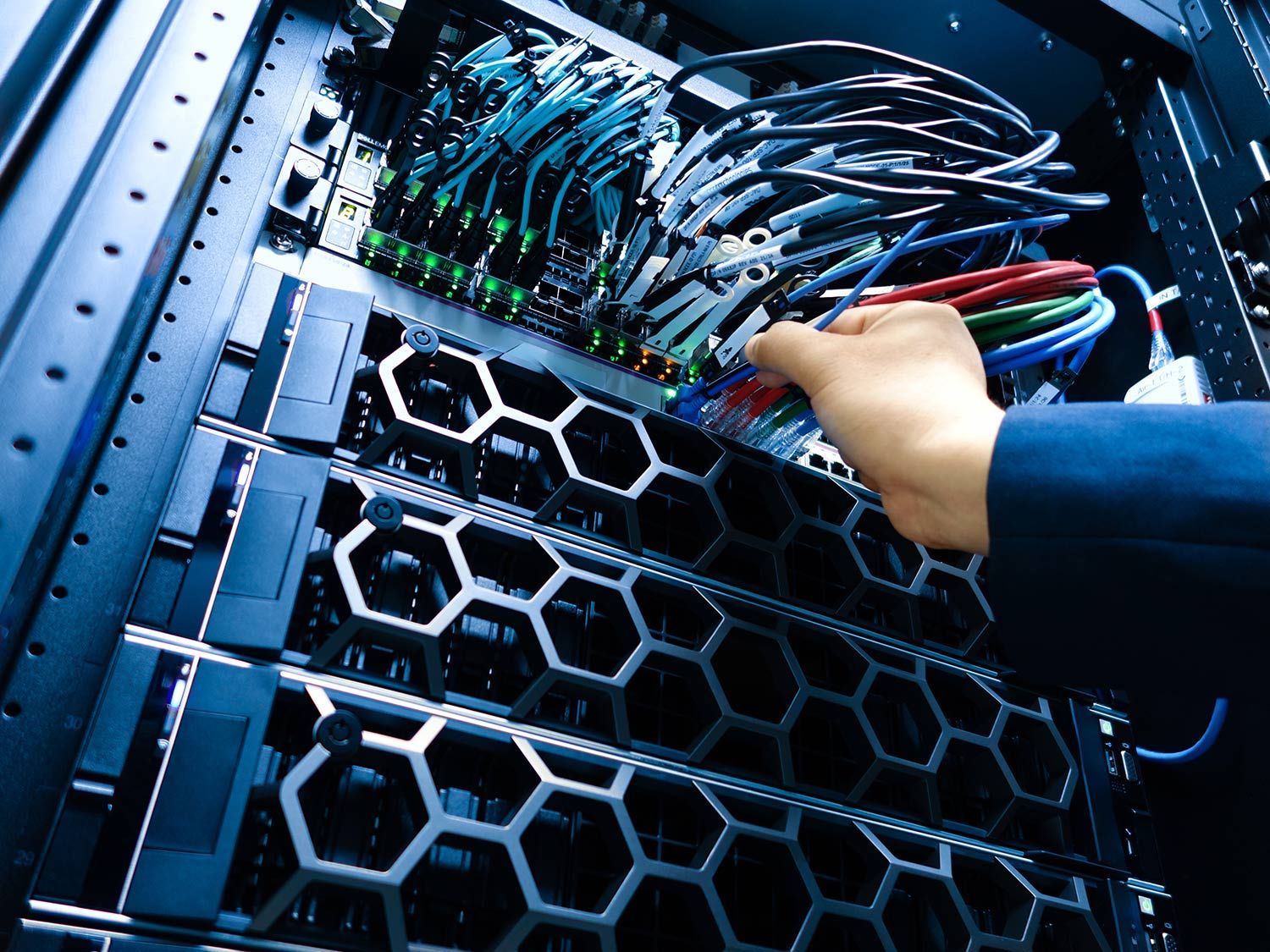 Worker checking the network cables
