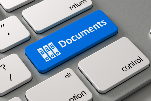 Keyboard key representing digitizing supporting documents for a uk visa application