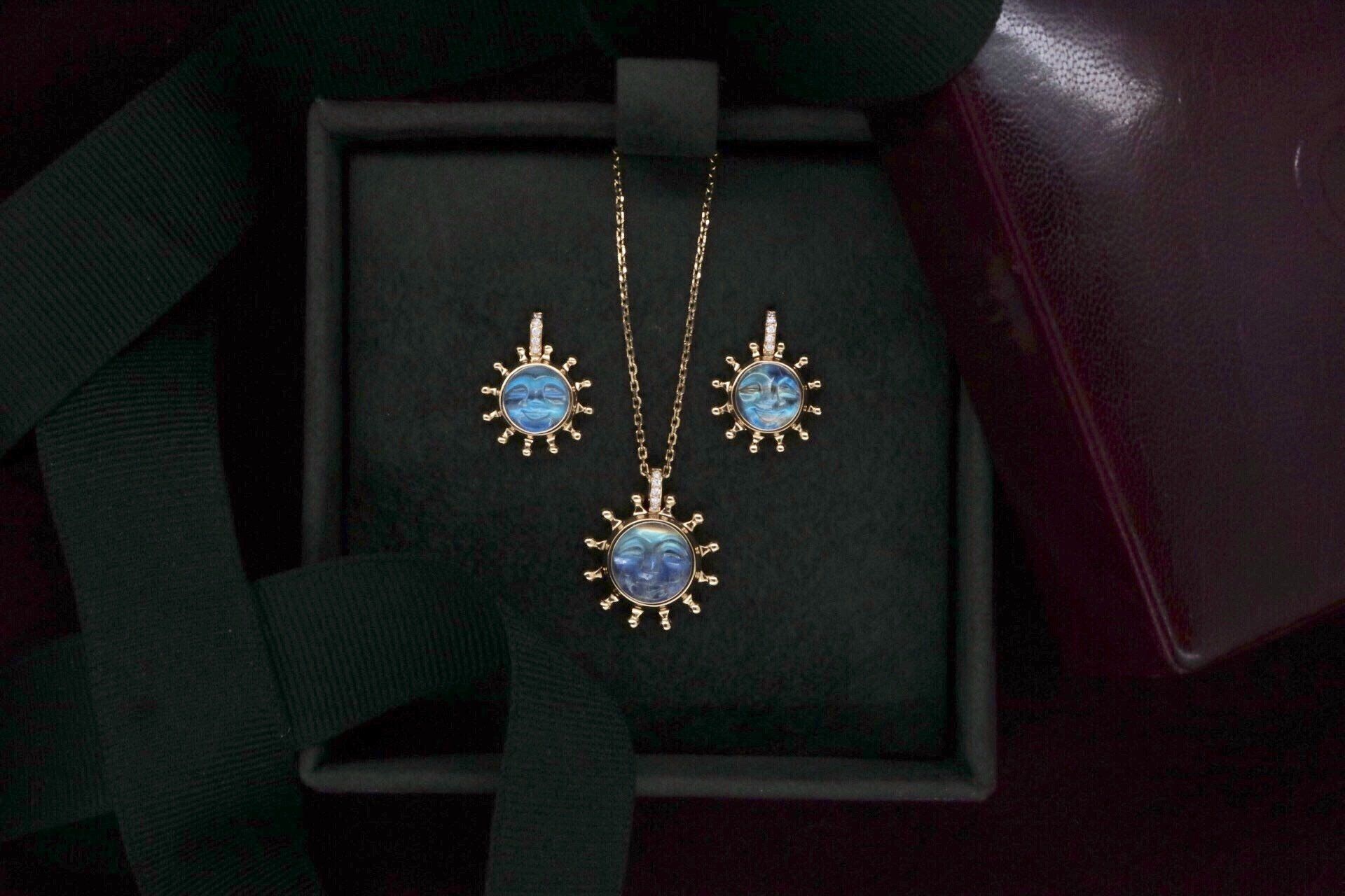 Moonstone and diamond pendant and earrings