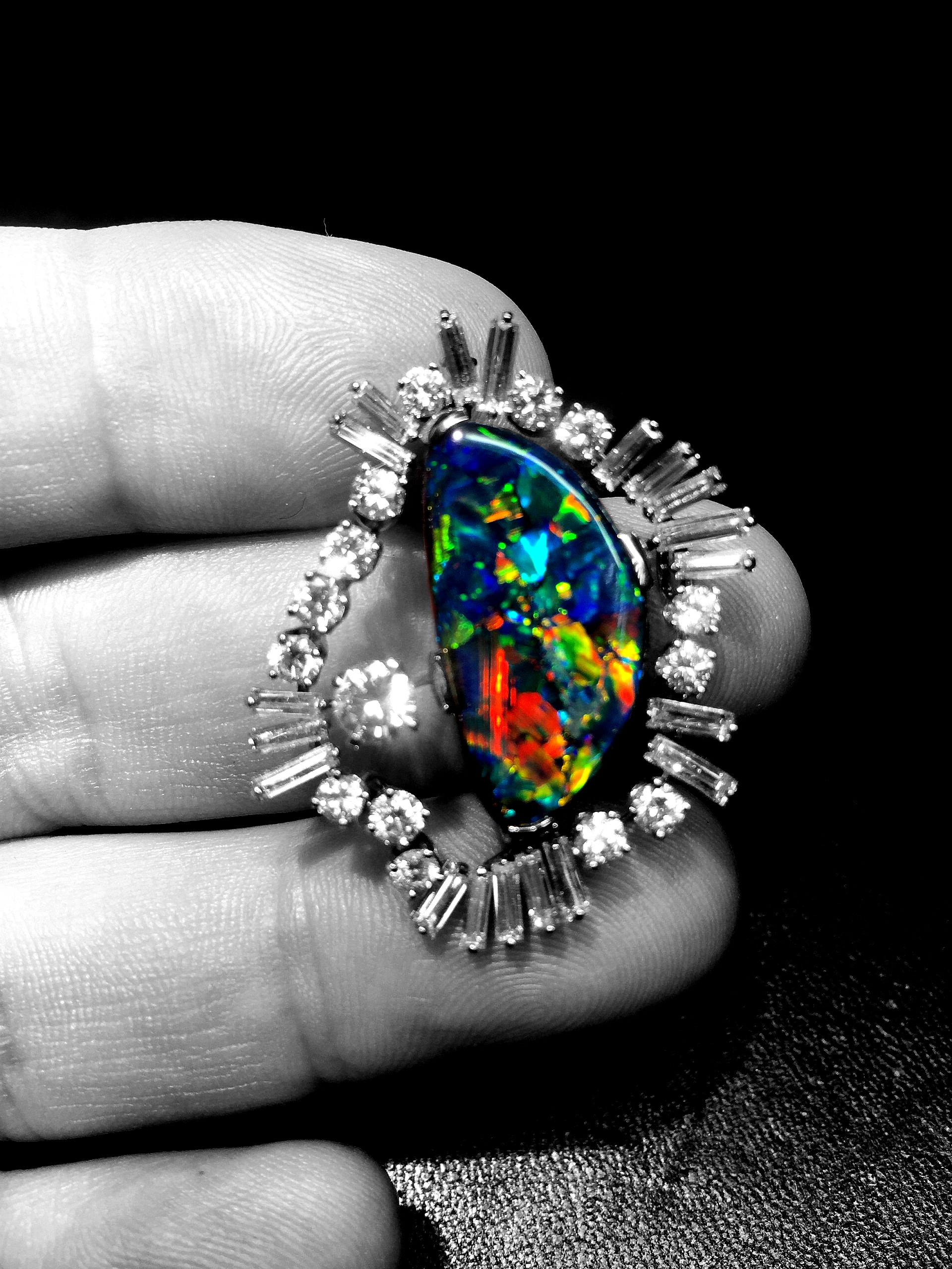 Exquisite black opal and diamond set pendant