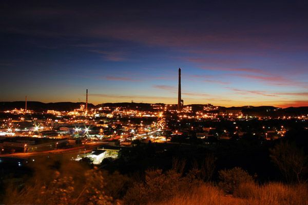 A City at Night With a Sunset in the Background — Battery Assist QLD In Brendale, QLD