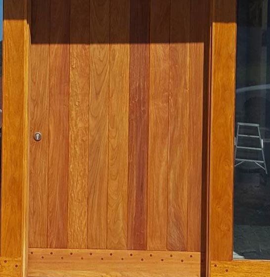 Wood Front Entrance Door — Coastal Design Joinery form Custom Doors in Coffs Harbour, NSW