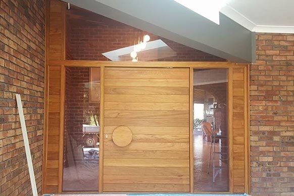 Wood Pivot Doors — Coastal Design Joinery form Custom Doors in Coffs Harbour, NSW