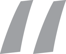 Two gray slanted vertical bars on a white background