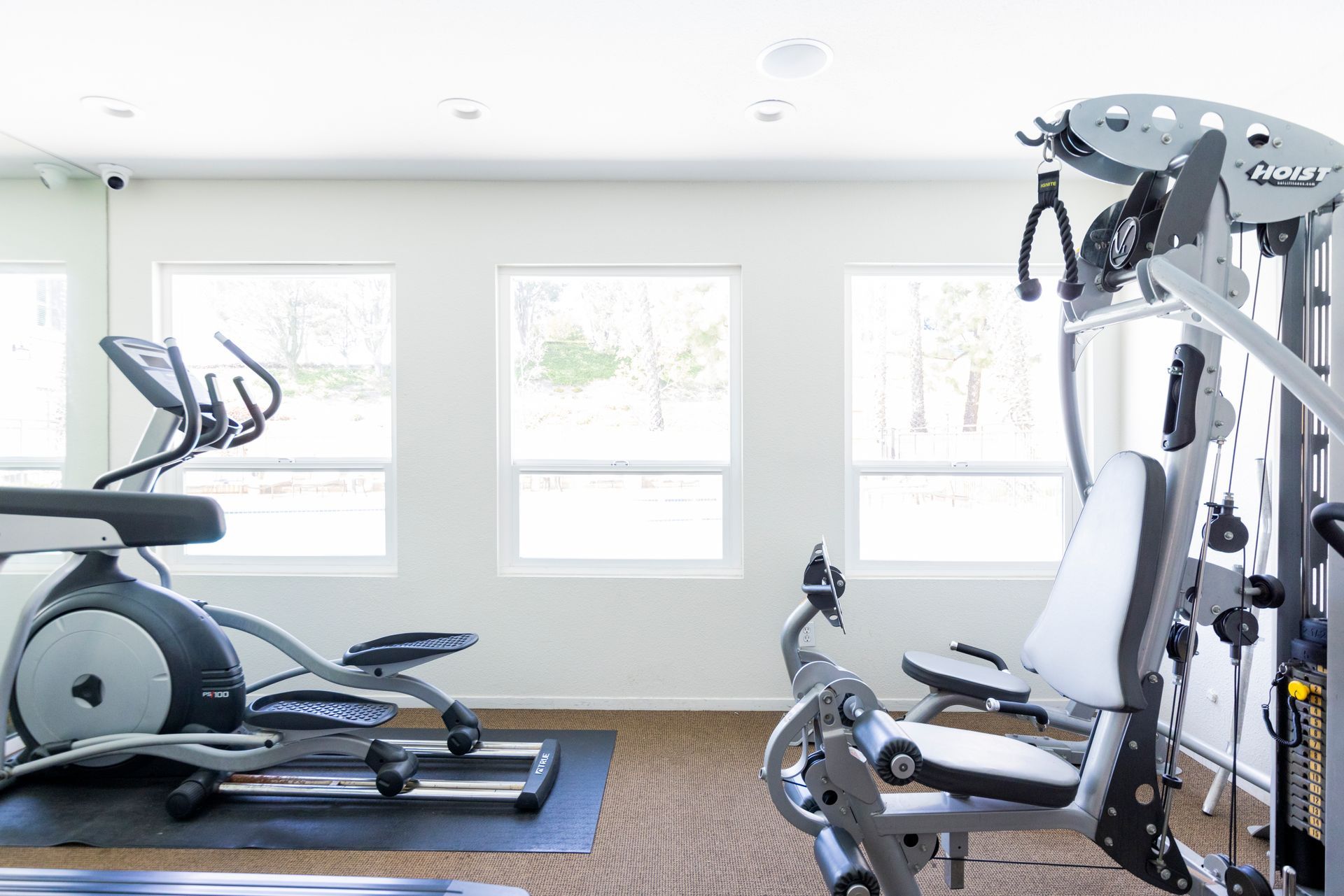Fitness center photo with various equipment