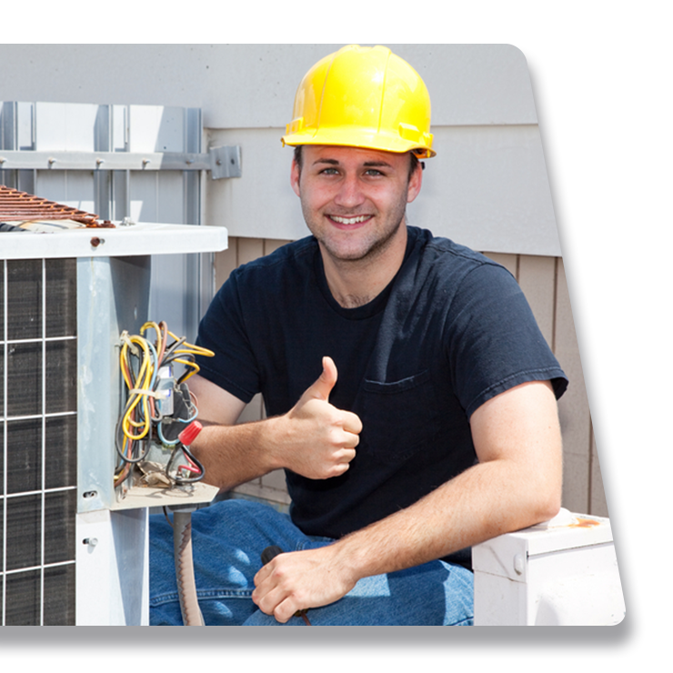 A man wearing a yellow hard hat is giving a thumbs up