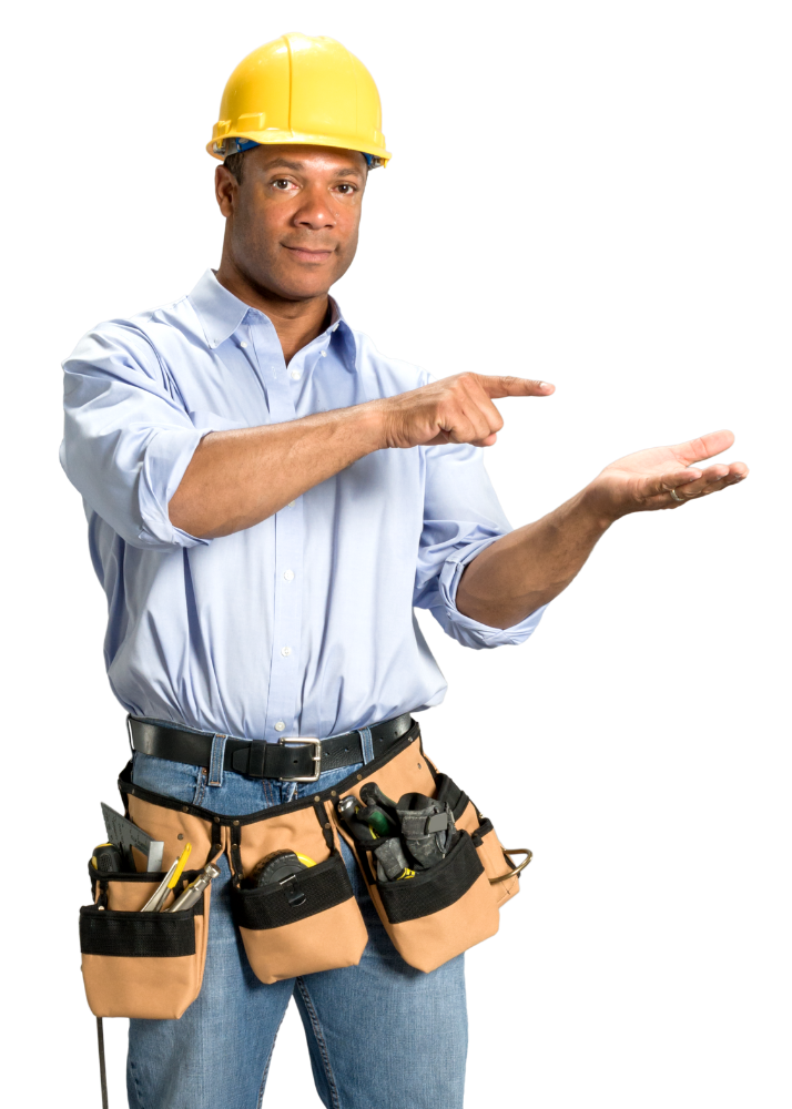 A man wearing a hard hat and tool belt is pointing at something