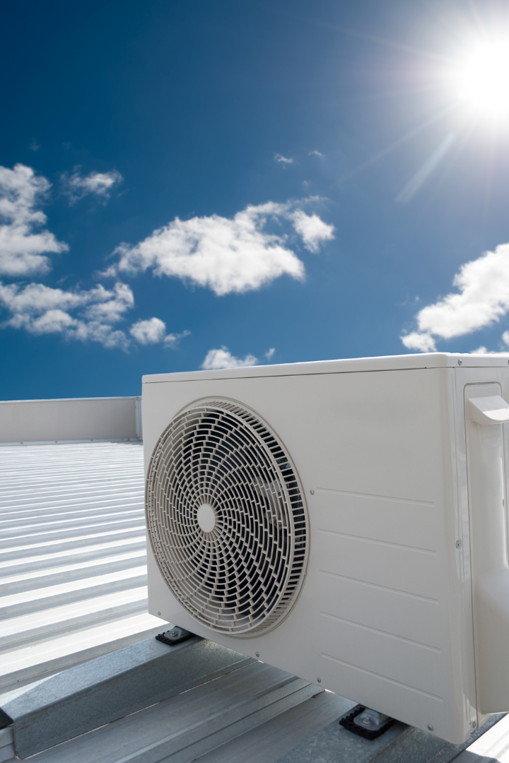 A close up of an HVAC Systemn with the sun shining through it
