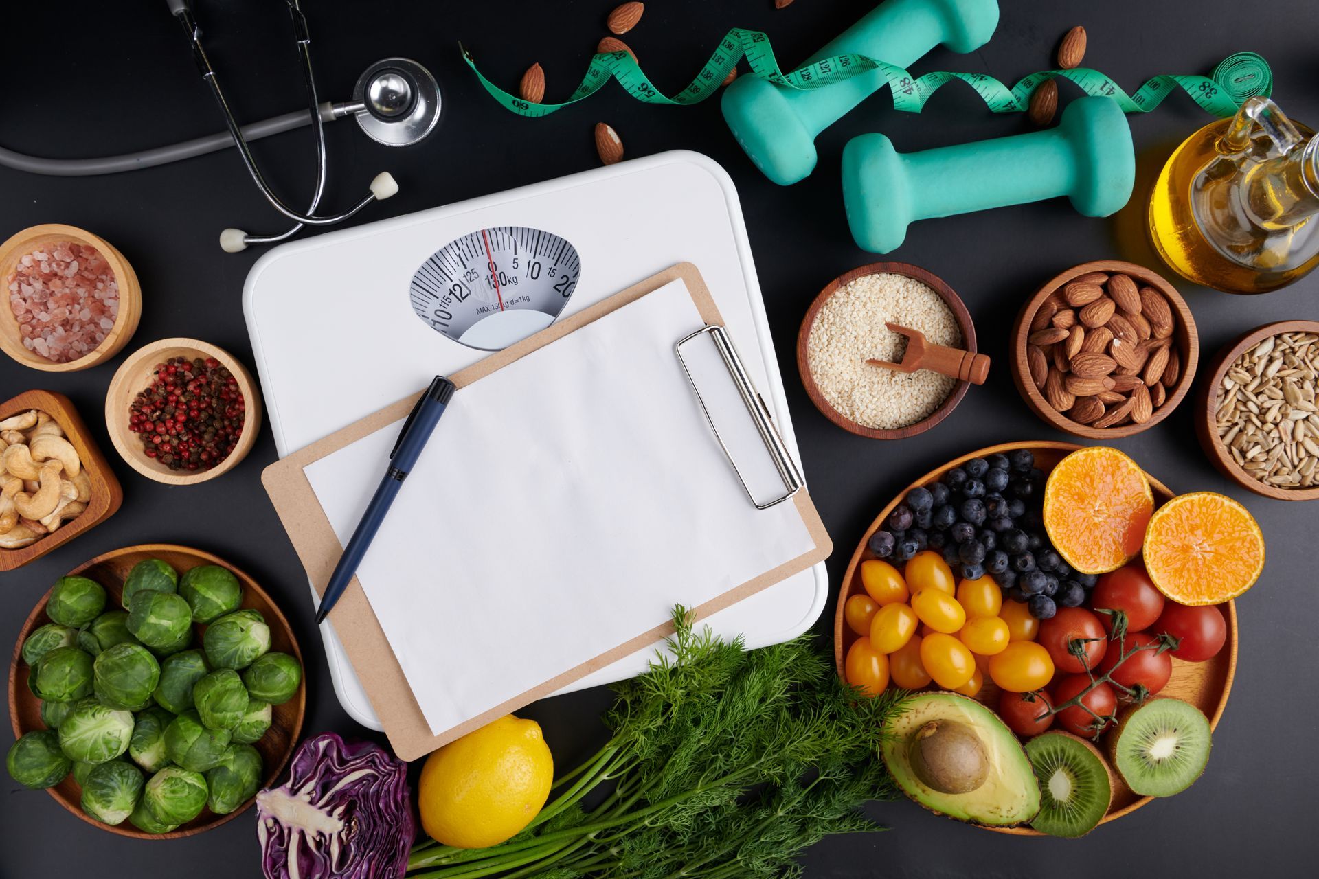 There is a clipboard with a pen on it surrounded by fruits and vegetables.