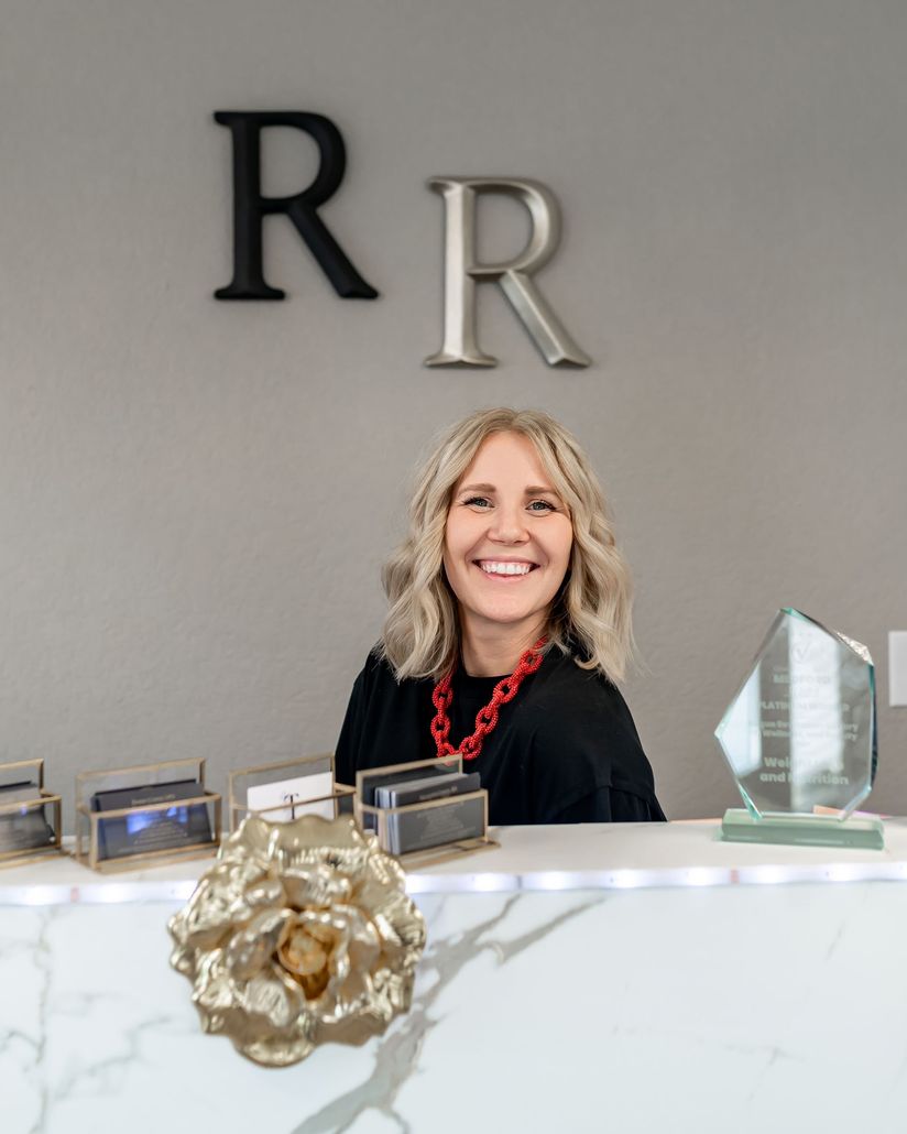 a marble counter in a room with the letter r on the wall