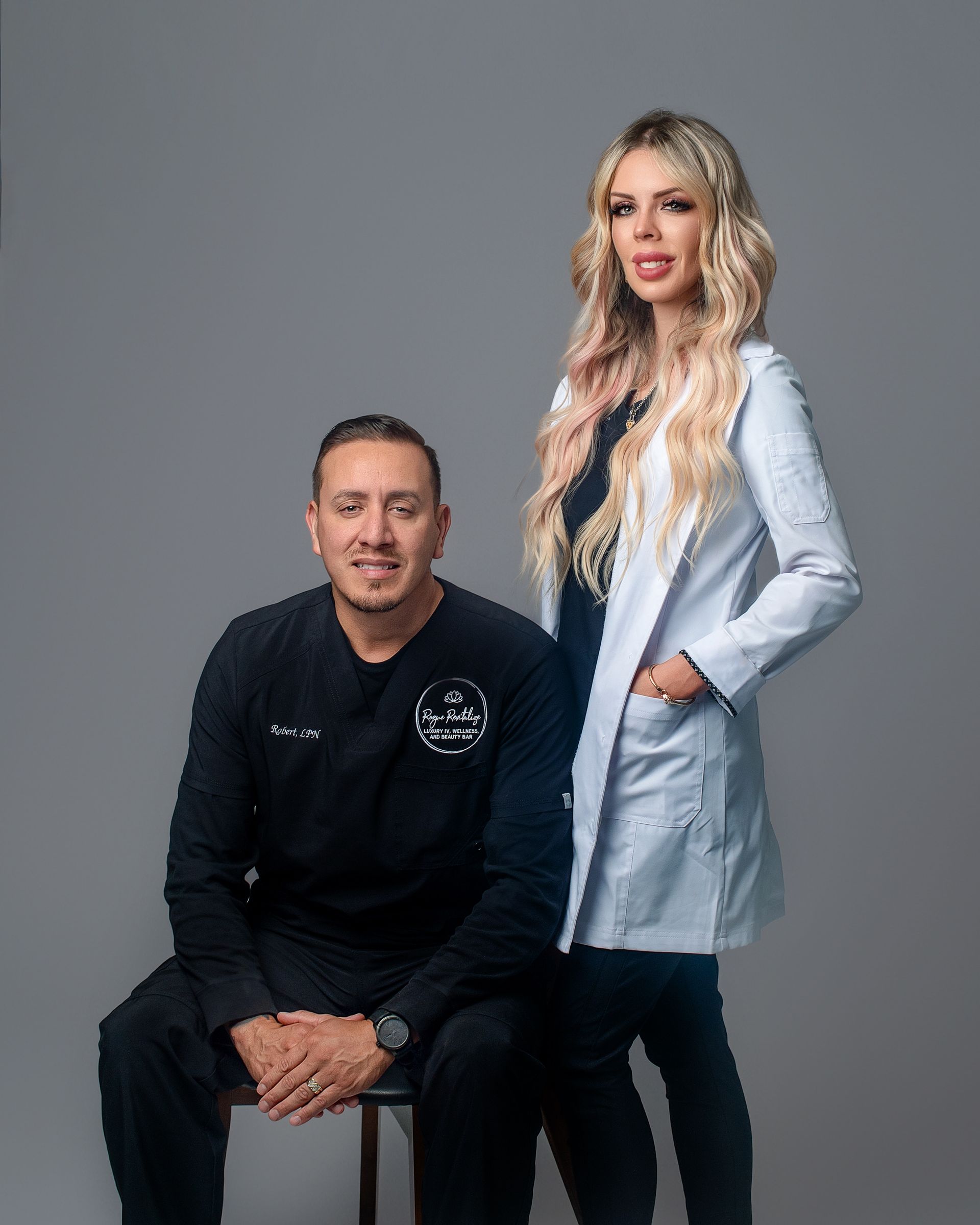 A man and a woman are posing for a picture together.