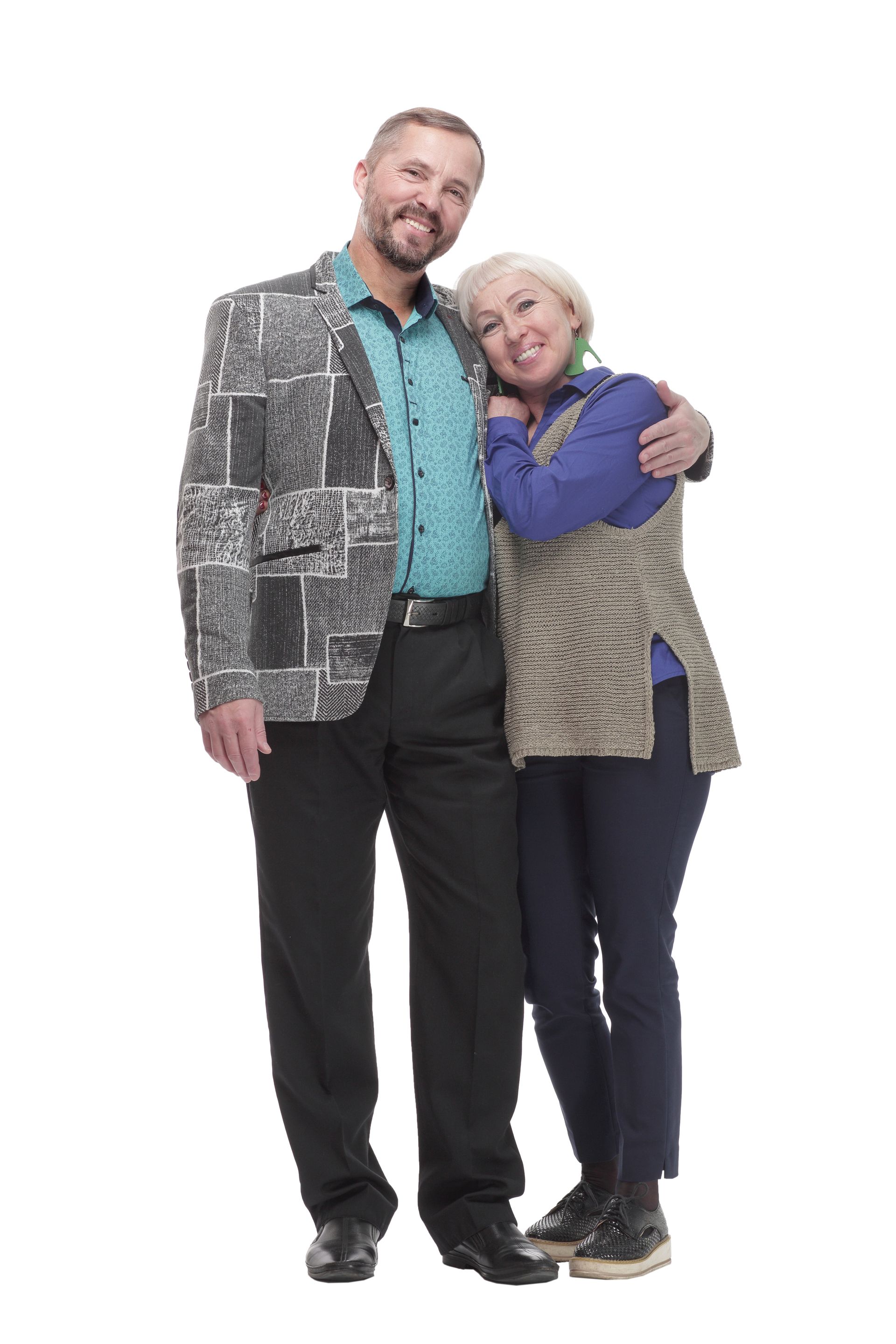 A man and a woman are standing next to each other on a white background.