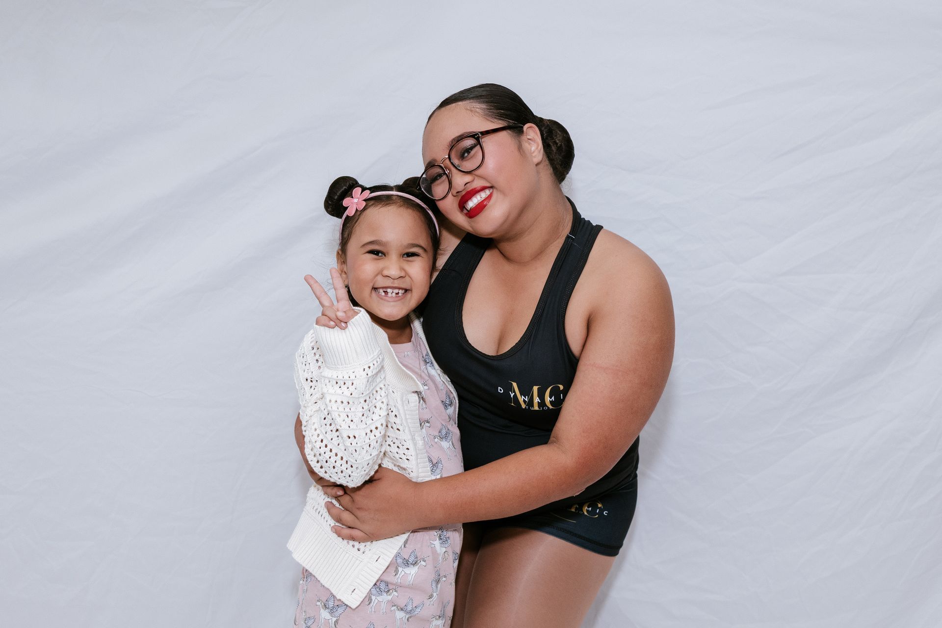 Two Girls Dancing on a Patterned Surface at an Outdoor Event — Mc Dynamic Studio in Currajong, QLD