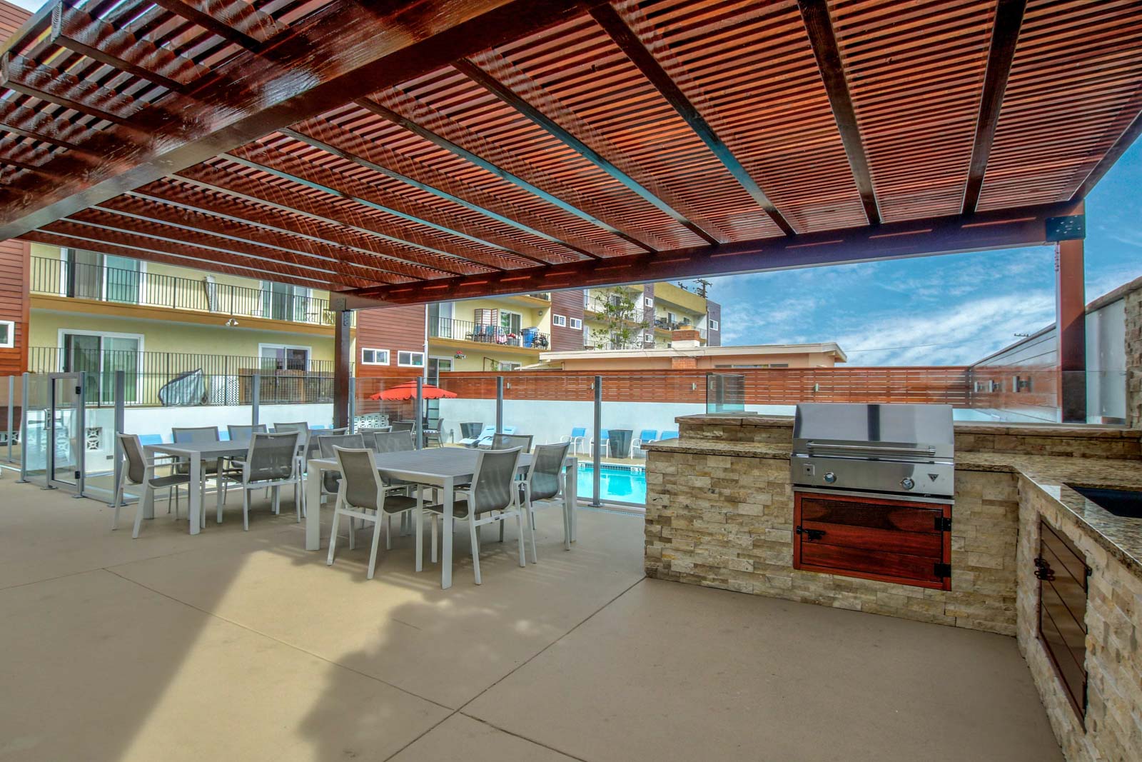 outdoor pool area with bbq