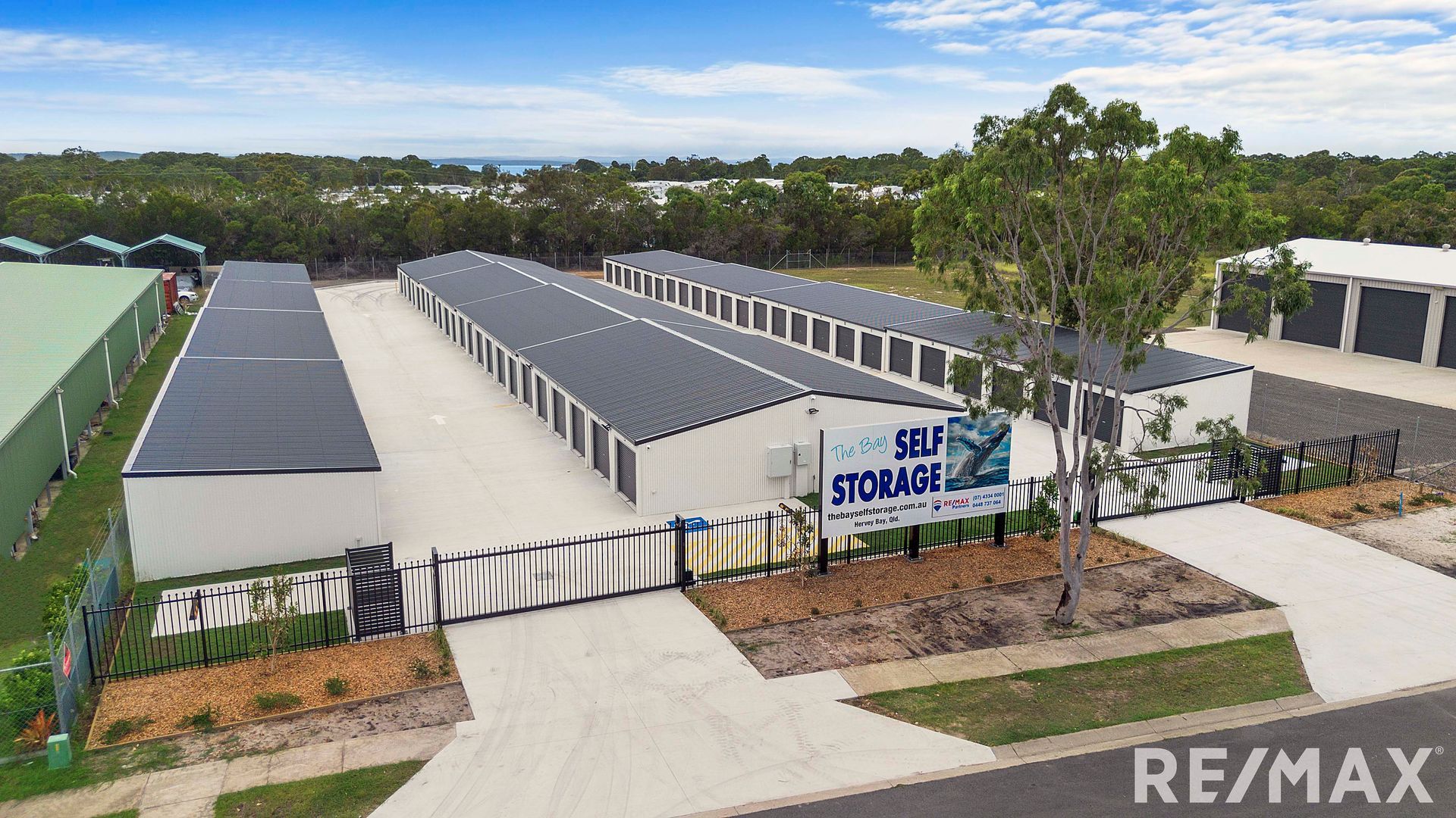 Exterior of Three Storage Units With Dark Blue Doors — The Bay Self Storage In Urangan, QLD