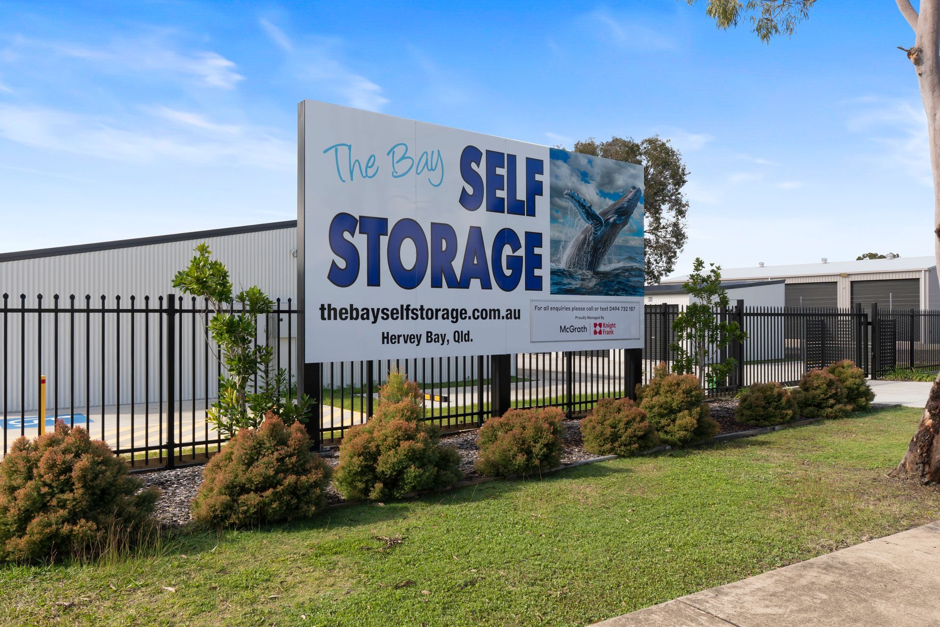 A Storage Unit Door With A Padlock On It — The Bay Self Storage In Urangan, QLD