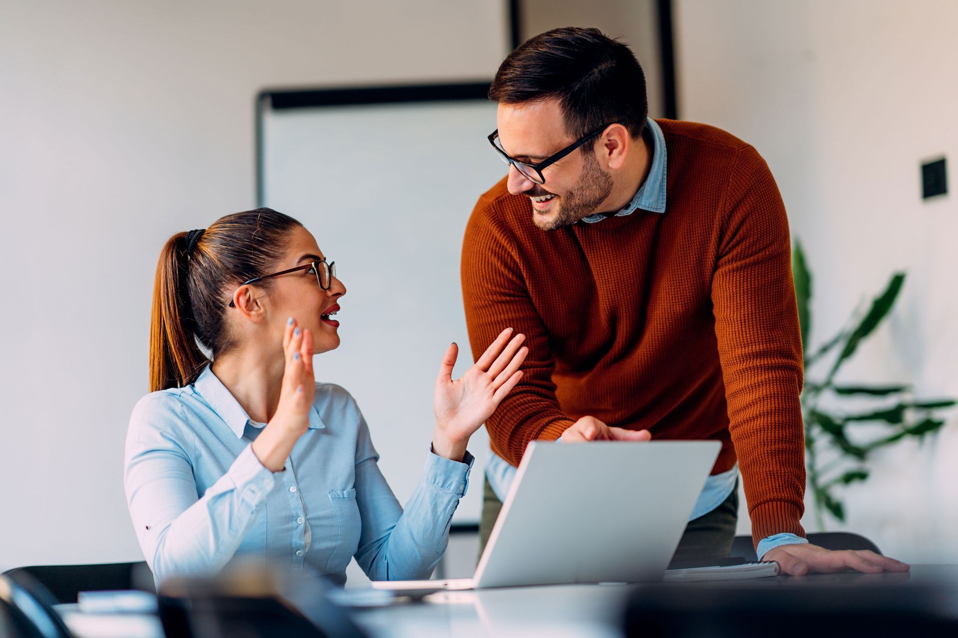 Woman helping the man in his business