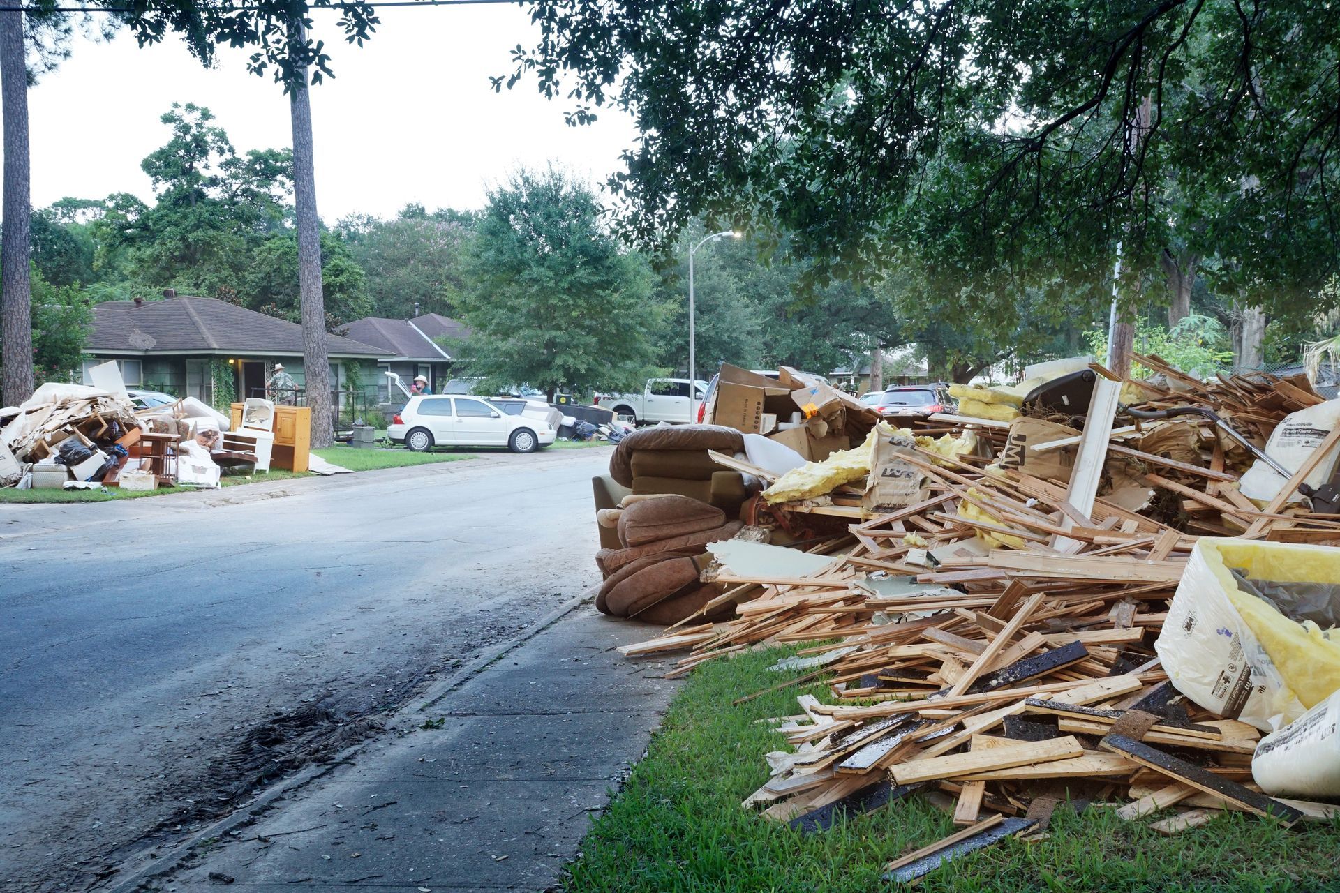 A pile of rubble sits on the side of the road