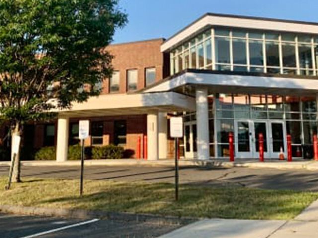 An exterior shot of Pomperaug High School
