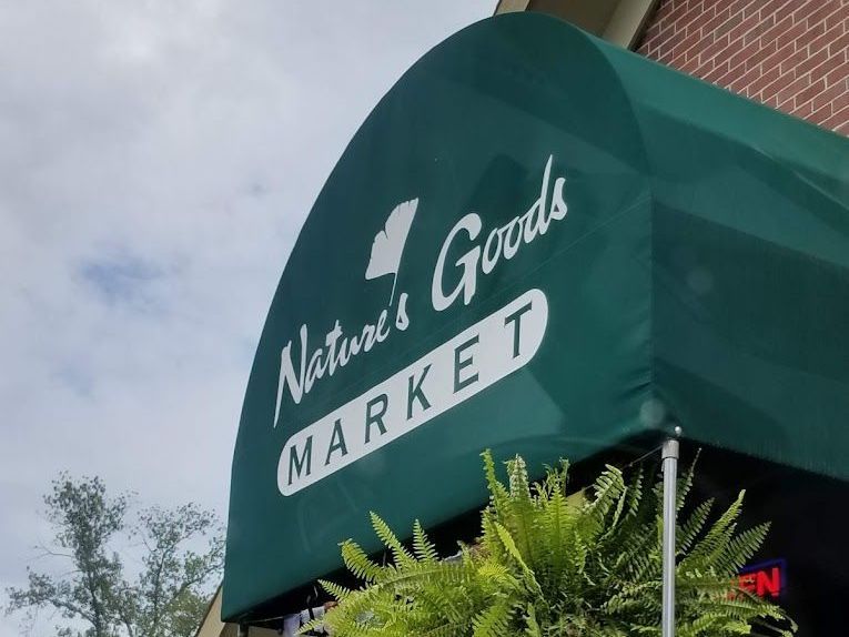A green awning for nature 's goods market