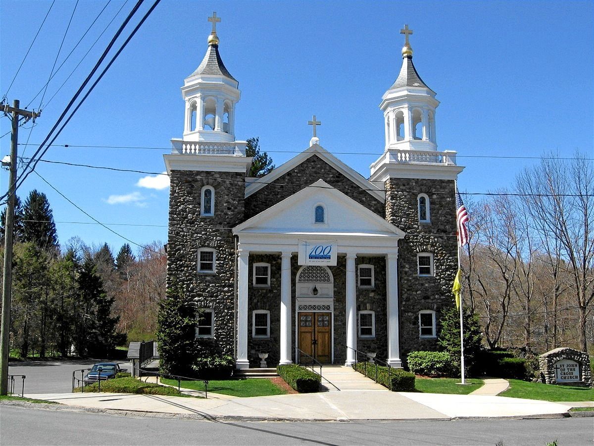 A church with two towers on top of it