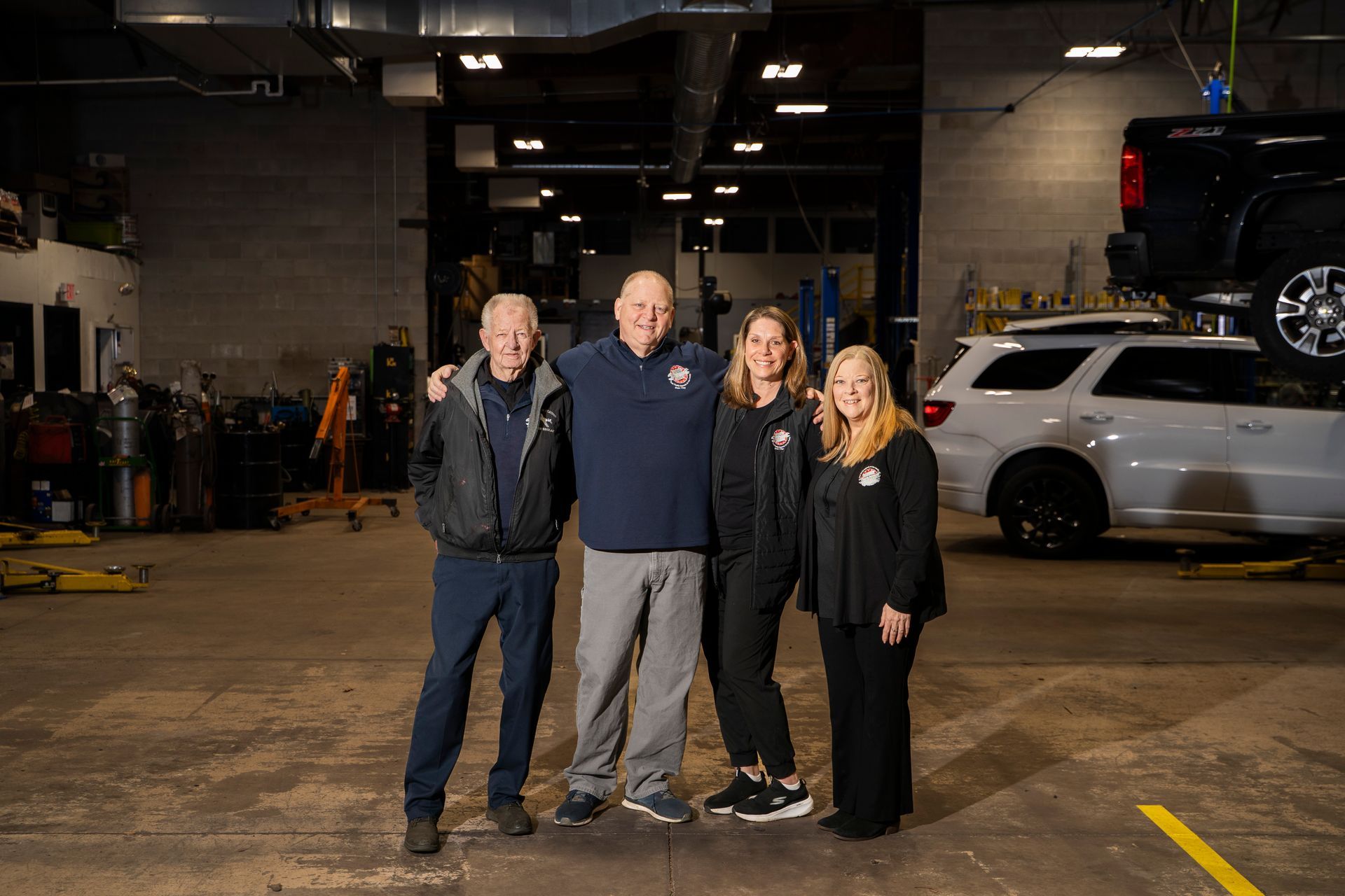 Grove Street Auto Family Owners in the shop.