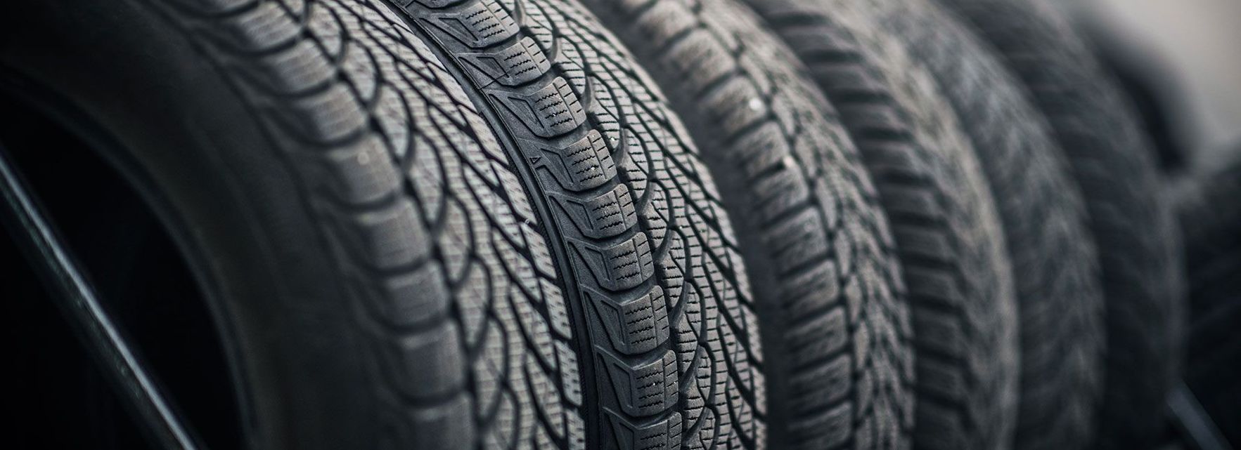 a close up of a stack of tires sitting on top of each other .