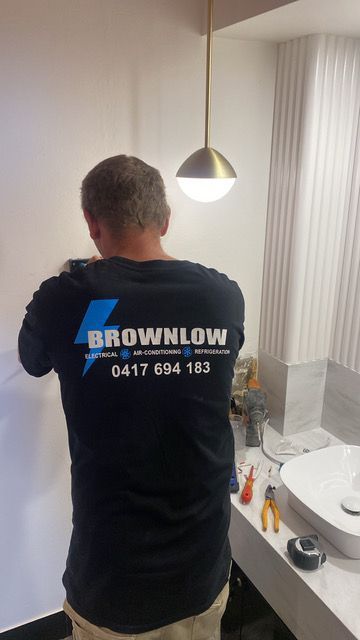 Electrician Working On Wires — Electricians In Thirroul, NSW