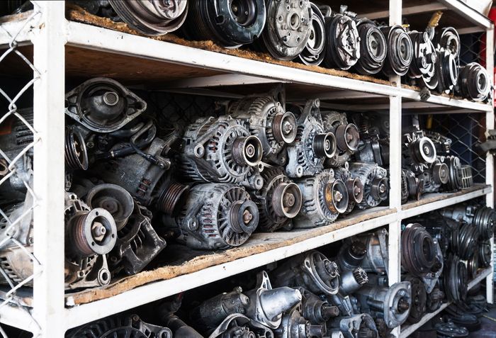 A warehouse filled with lots of old car parts.