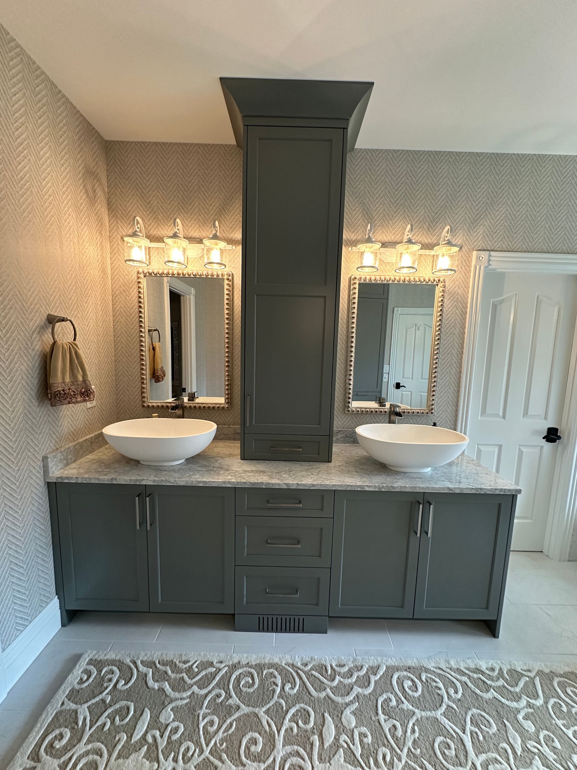 A bathroom with two sinks and two mirrors.