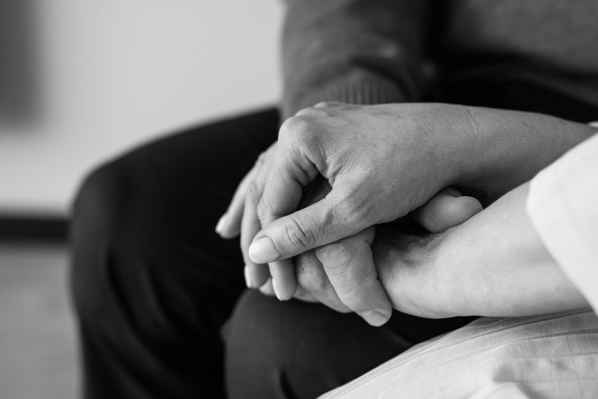 Woman With Head in Hands, Comforted by Person, in a Counseling Session — Mind Guidance Centre in Wangi Wangi, NSW