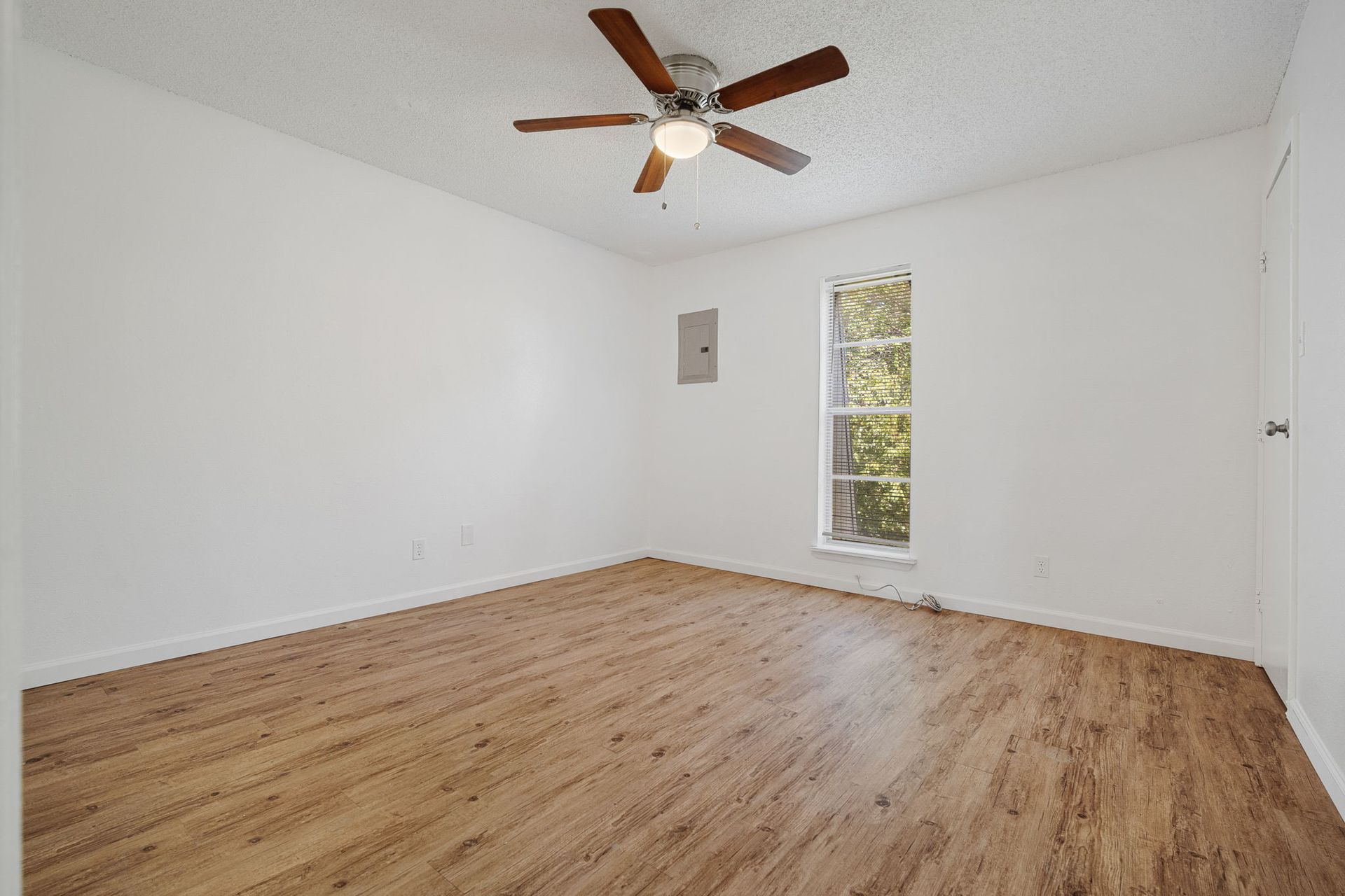 Photo showing a room with a tall window