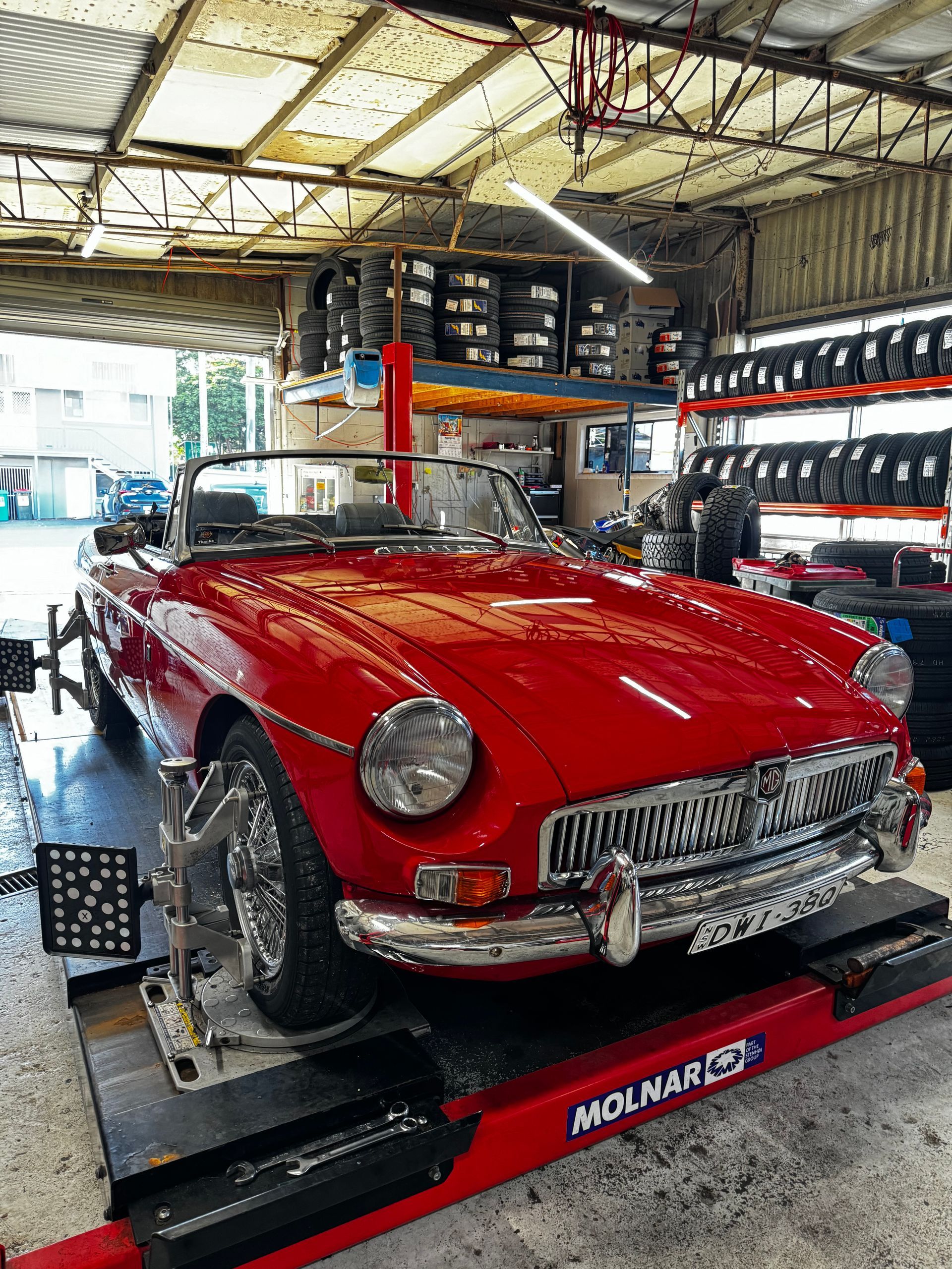 A Convertible Car on A Wheel Alignment Machine in A Garage — Jakes Tyres in South Murwillumbah, NSW