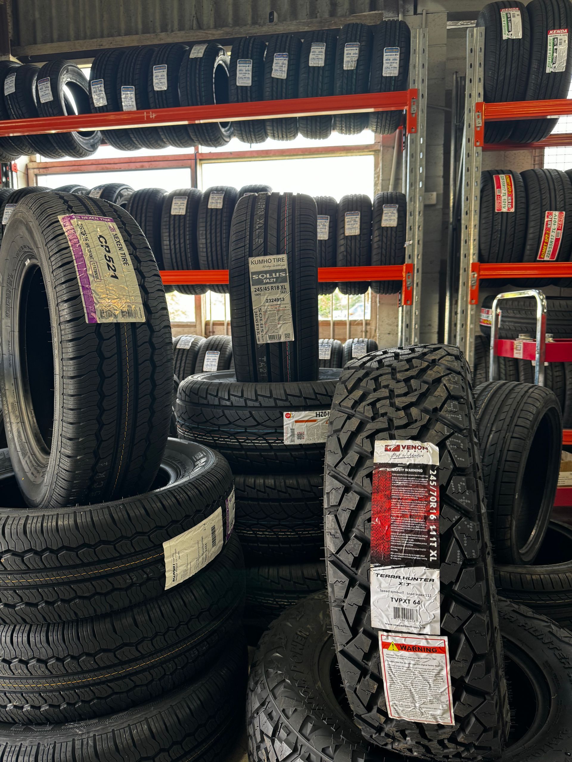 A Tires Stacked in A Tire Shop — Jakes Tyres in South Murwillumbah, NSW