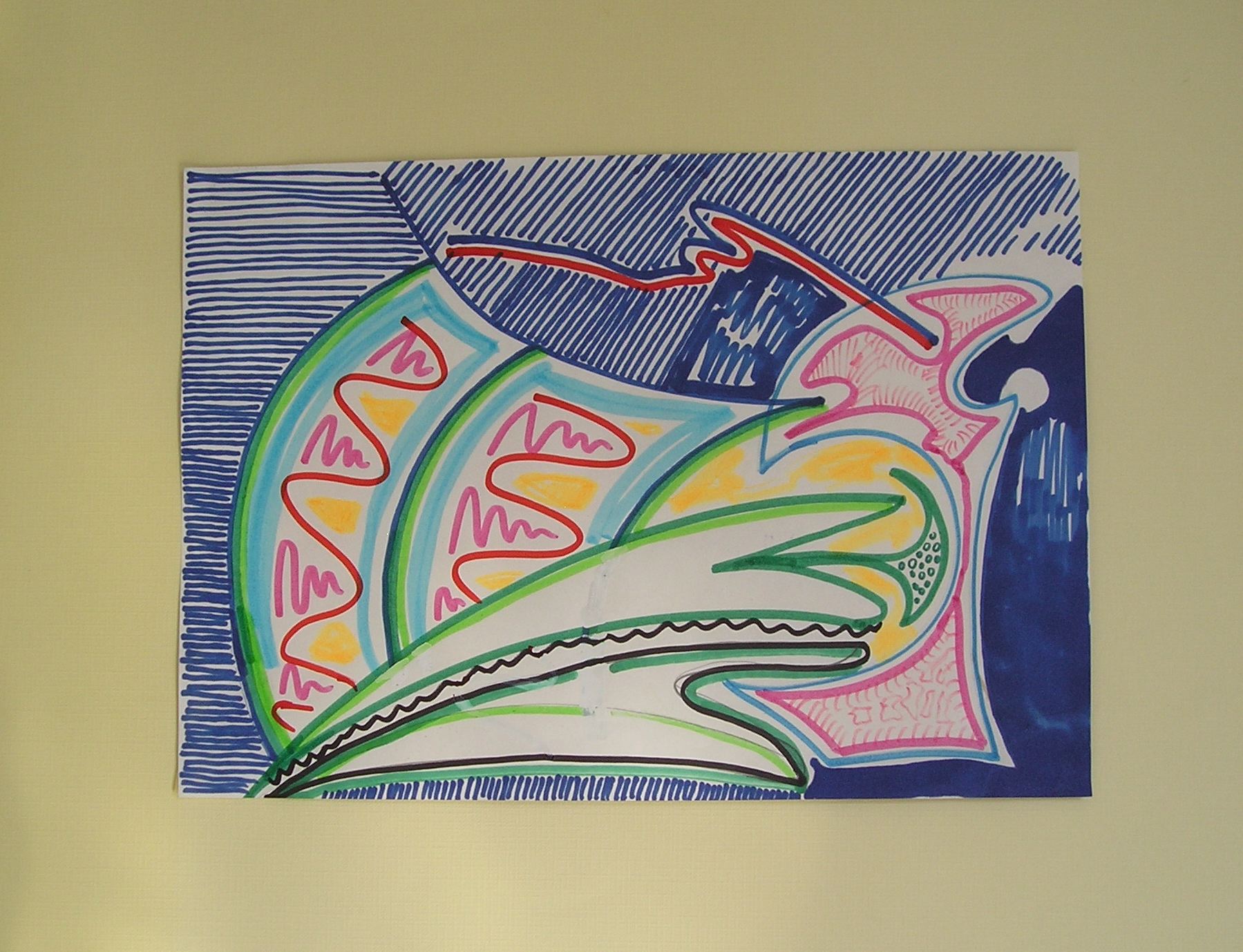 Eine bunte Zeichnung der Hand einer Person an einer Wand