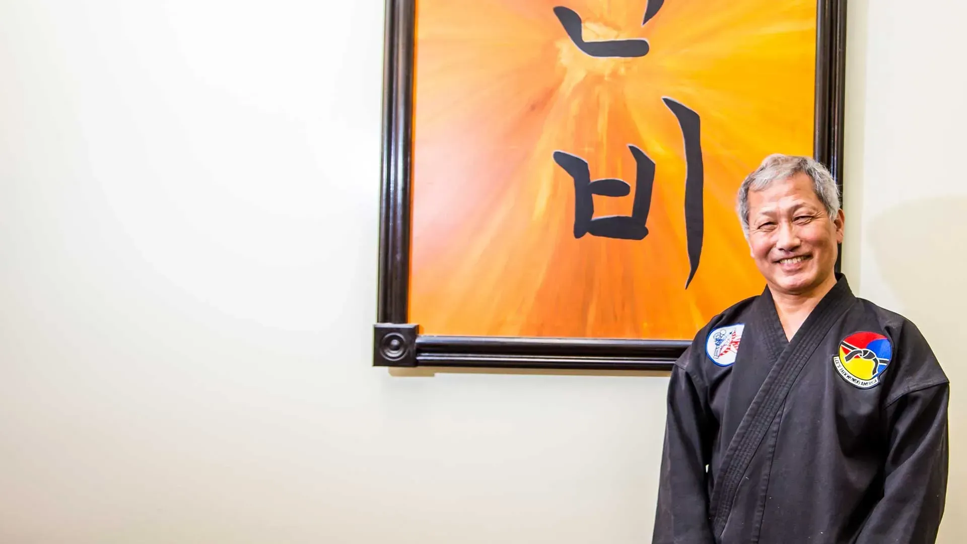 Black martial arts instructor.