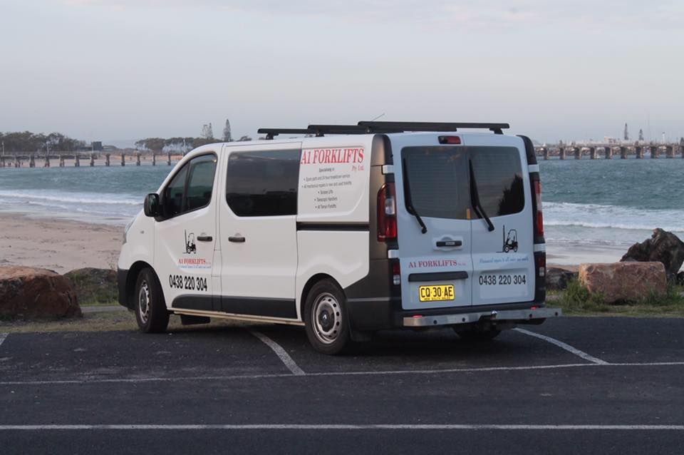 White and Blue Van Parked Near a Beach — A1 Forklifts In Kempsey, NSW