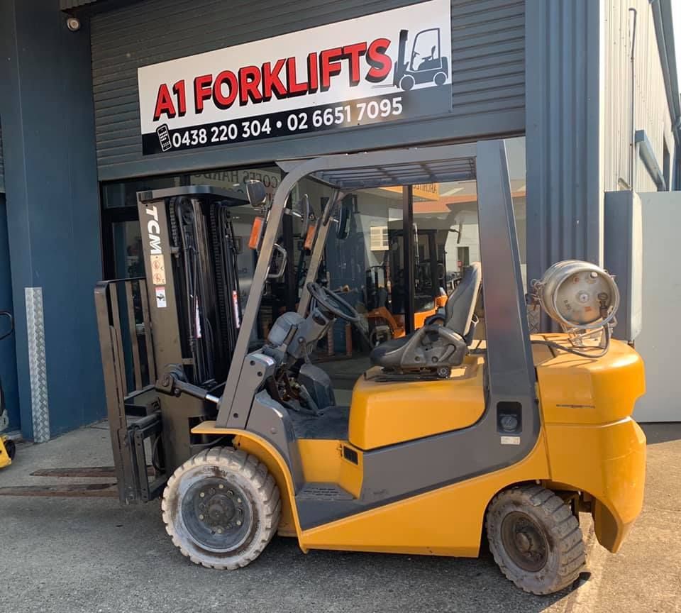 Yellow Forklift Parked Outside a Business — A1 Forklifts In Grafton, NSW