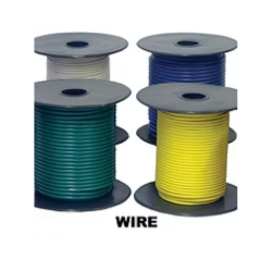 Spools of electrical wire in green, yellow, blue, and white.
