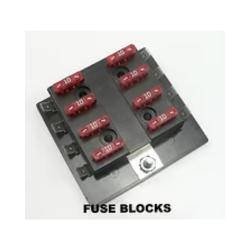 Black fuse block with eight red 10-amp blade fuses installed, text 